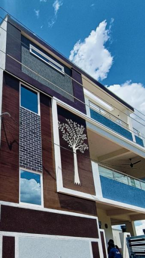 TrueLife Homestays - Chinmai Nivas - Modern 2BHK homes for family - Tirumala Mountain View - Best Peaceful Location - Many restaurants nearby - Large hall, AC bedrooms, Modular Kitchen - Fast WiFi - A